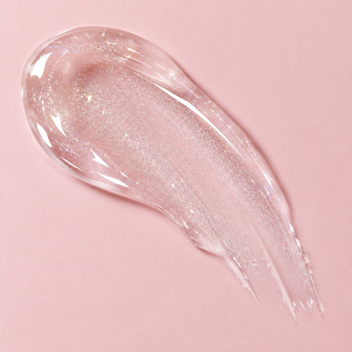 Luma Lips plumping lip gloss clear texture close-up
