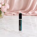 Luma Lips plumping lip gloss on a vanity